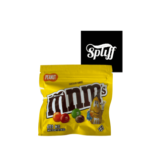 Peanut M&M's chocolate candies in dispensary display at Spliff Nation Dispensary.